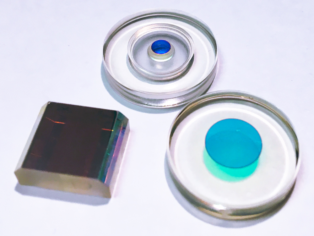Moated ring laser gyro mirrors