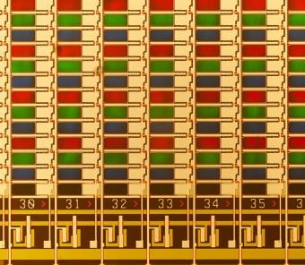 Editorial_PhotonicsSpectra_FlatPanelDisplayHighMag.jpg Flat panel inspection requires optics with excellent color correction for individual inspection of red, green, and blue pixels, without the need to refocus, regardless of which pixel color is active.